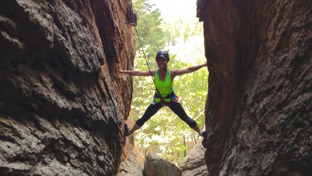 Woman rock climbing